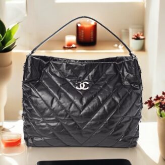 Chanel  
Aged Calfskin Chevron Small Big Bang Hobo Black
