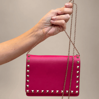 Rockstud-Detailed Chain Strap Flap Bag
Pink