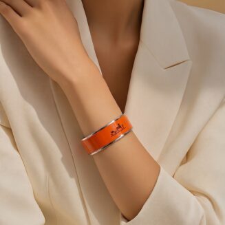 Hermes Orange Enamel Palladium Plated Caleche Bangle Bracelet